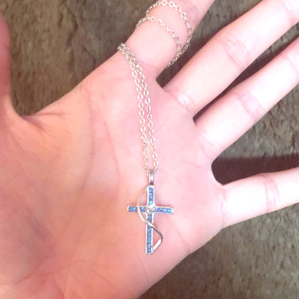 Silver cross necklace with blue studs